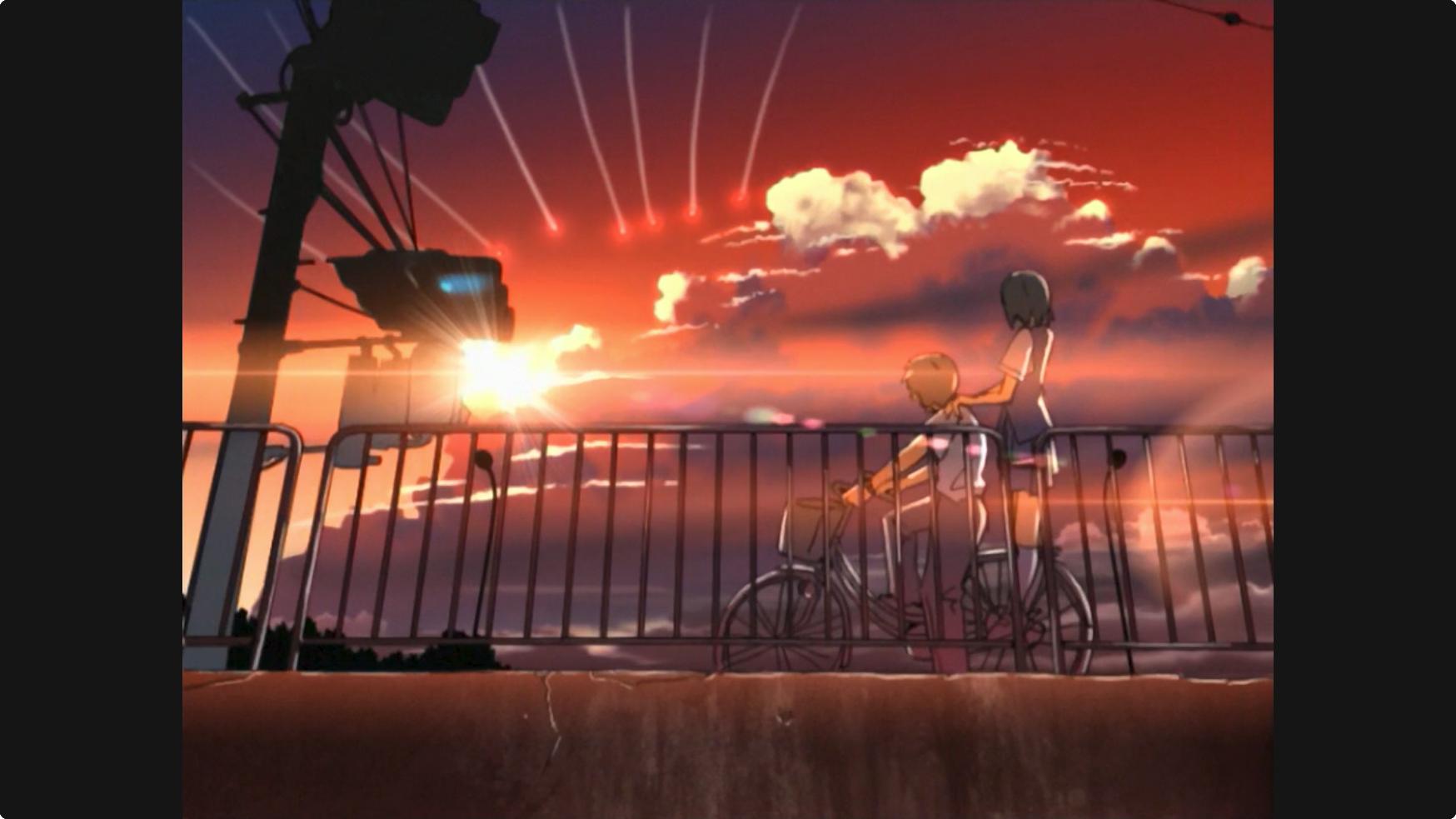 Mikako et Noboru sur un vélo au crépuscule