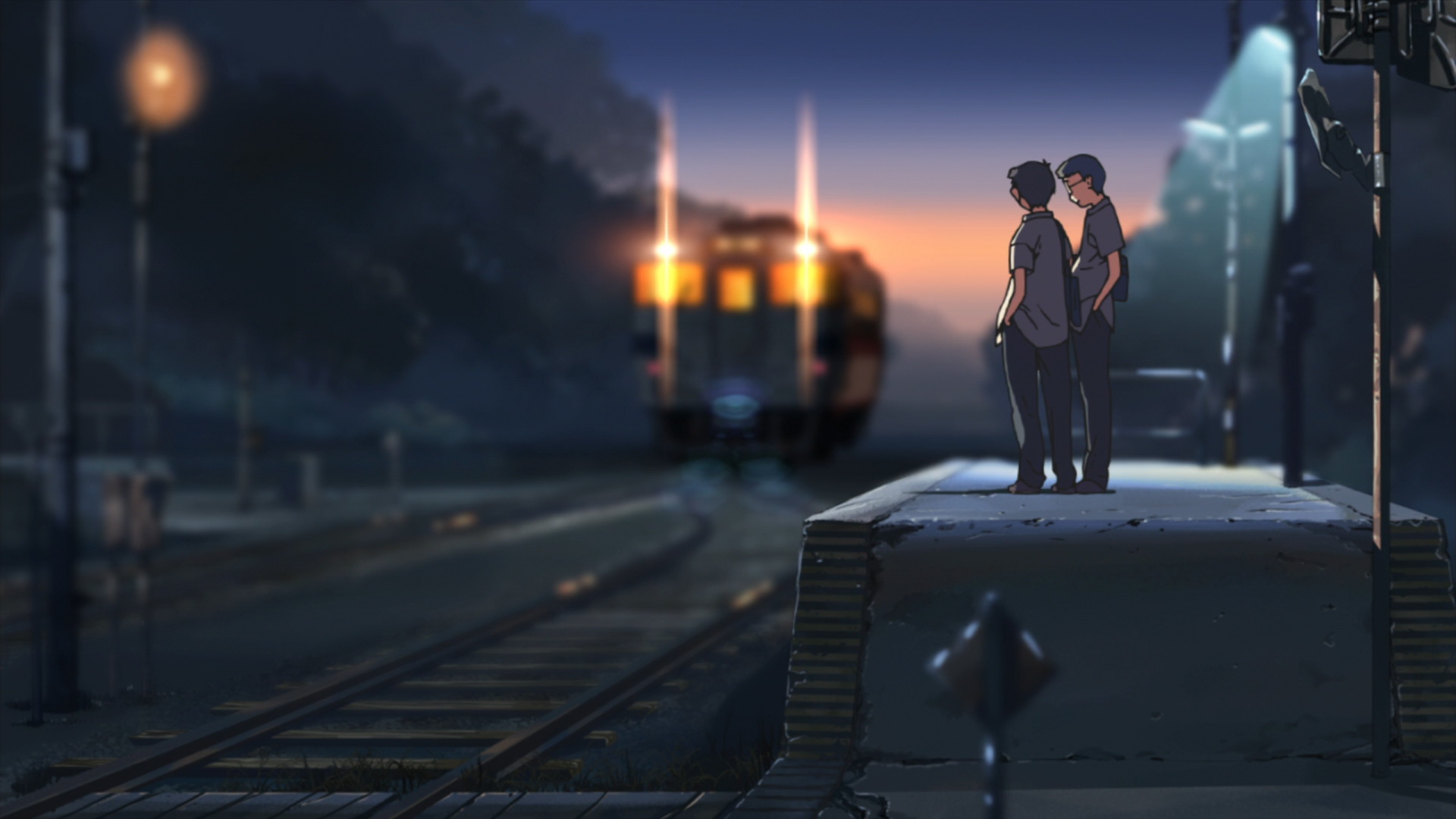 Hiroki et Takuya sur le quai d'une gare